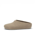 A single BAABUK wool felt slip-on slipper shown from a side profile view against a solid white background.