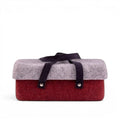 Baabuk Bordeaux wool beer cooler with a grey lid, red base, and dark leather carrying strap on a white background.