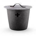 Baabuk dark grey felted wool basket with a lid, leather handle, and Swiss cross cutout detail.