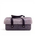 Baabuk dark grey wool beer cooler with a leather strap handle, designed for insulating beverage cans.
