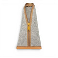 Baabuk grey wool pencil case with a tan leather base and a zippered closure for storing stationery and accessories.