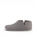 Baabuk Lisa light grey wool slipper with ankle coverage and natural crepe rubber sole, side view.