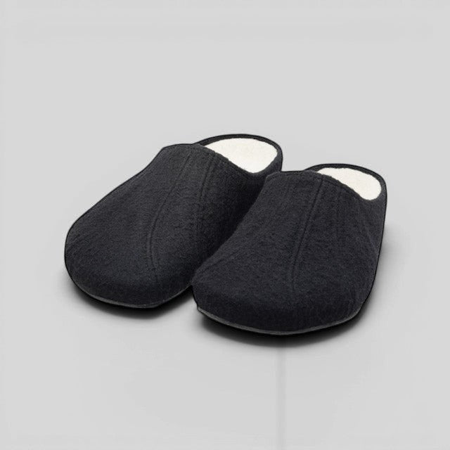 Baabuk Alpina black wool slip-on sandals with natural cork insole and minimalist design.