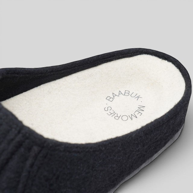 Baabuk Alpina black wool sandal slipper with a cork insole and collaborative branding detail.