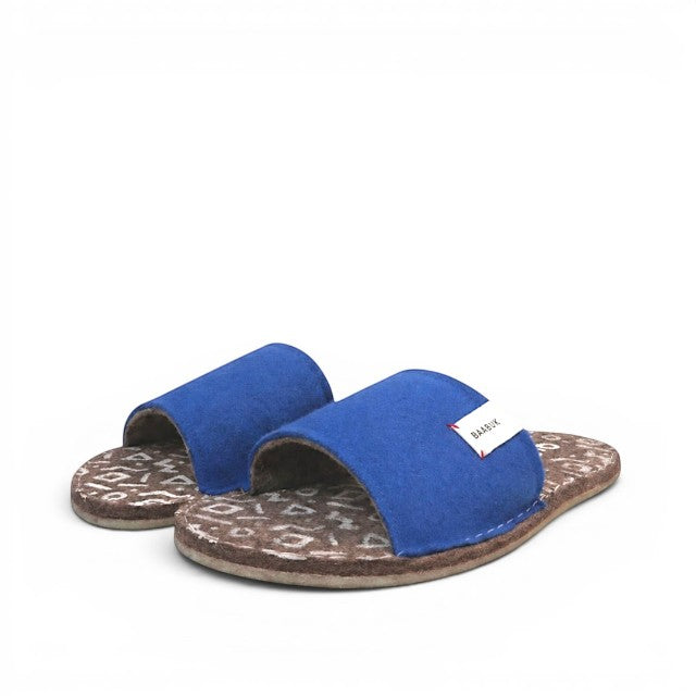 Baabuk Baabulette slide sandals in ultra marine blue wool with a patterned crepe rubber sole and white brand tag.
