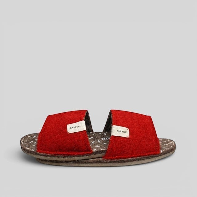 Baabuk Baabulette wool slide sandals in Swiss Red with a natural crepe rubber sole and branded fabric labels.