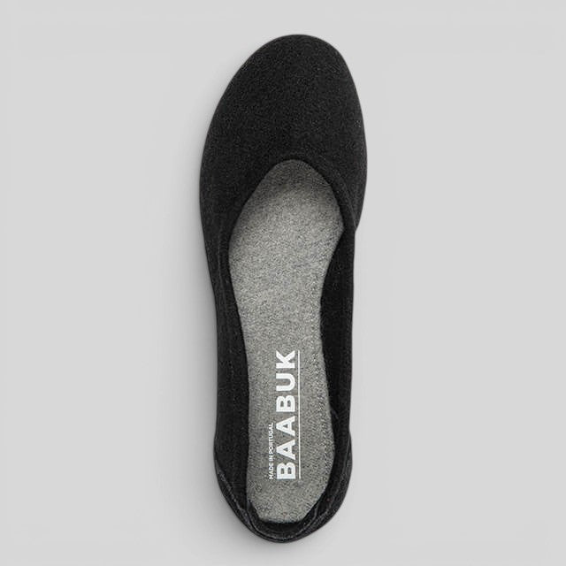 Baabuk black wool ballerina flat with grey wool-covered insole, top-down view on a neutral background.