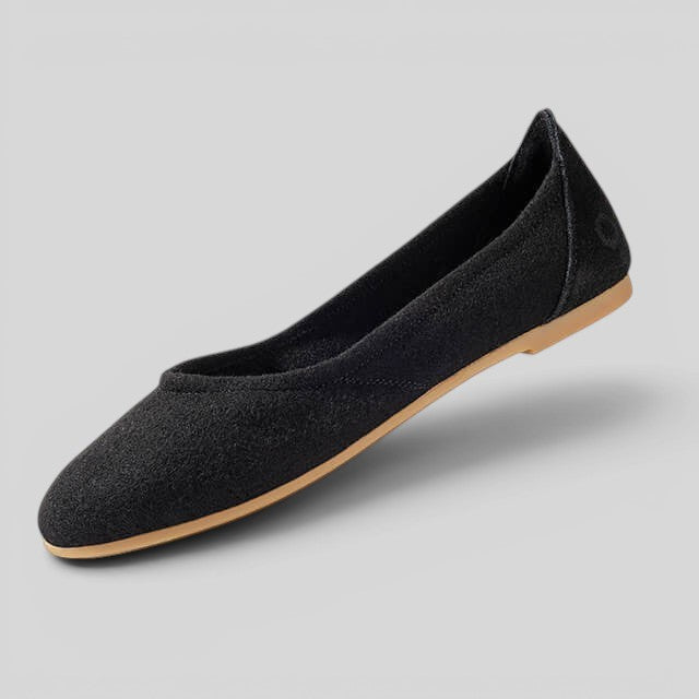 Baabuk black wool ballerina flat with a durable rubber sole and comfortable sheep wool upper.