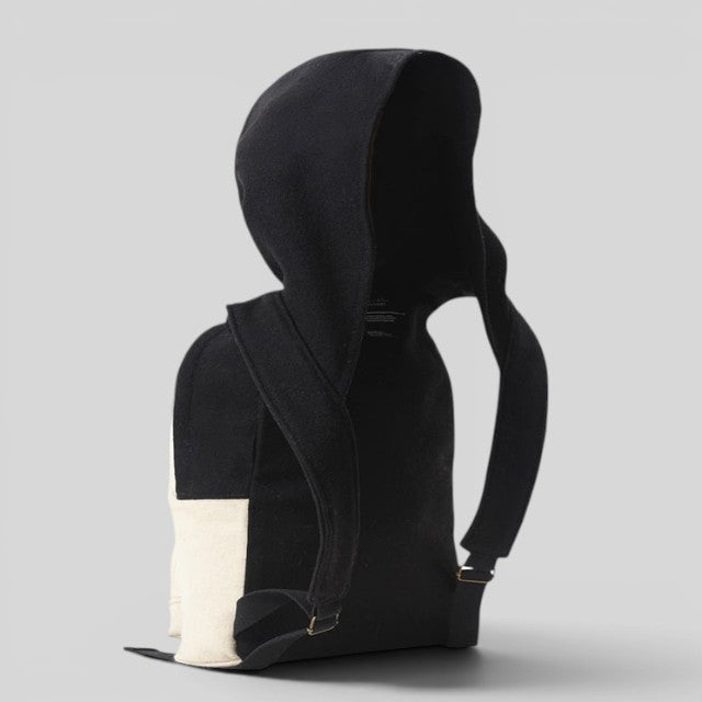 Baabuk Blacknose hooded backpack in black and cream wool with adjustable straps and a unique hoodie design.