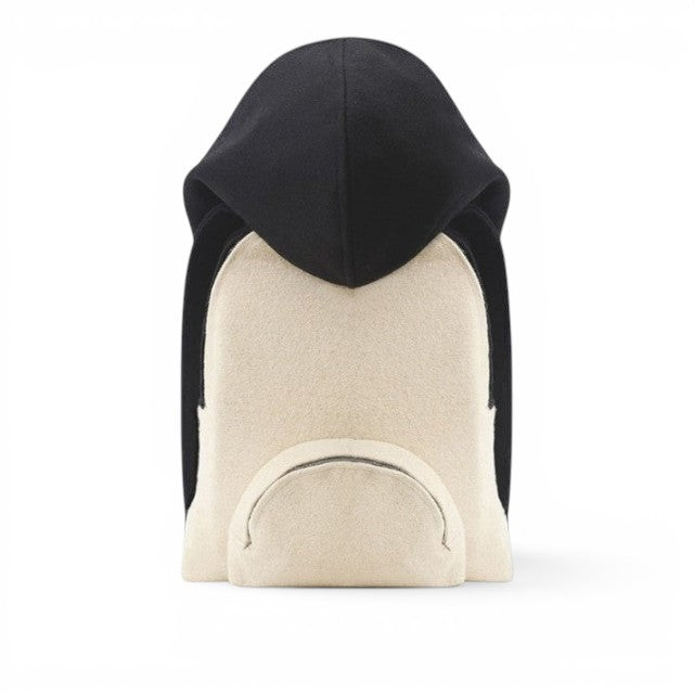 Baabuk Blacknose hooded backpack in cream and black wool with a front pocket, front view.