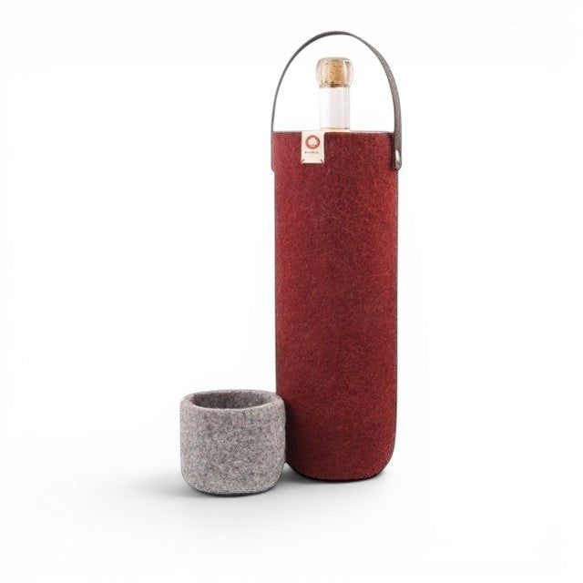 Baabuk Bordeaux wool wine cooler with leather strap and matching grey felt base for insulated bottle storage.