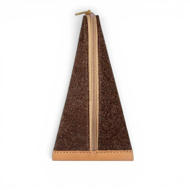Baabuk brown wool pencil case with a triangular shape, leather base, and beige zipper closure.