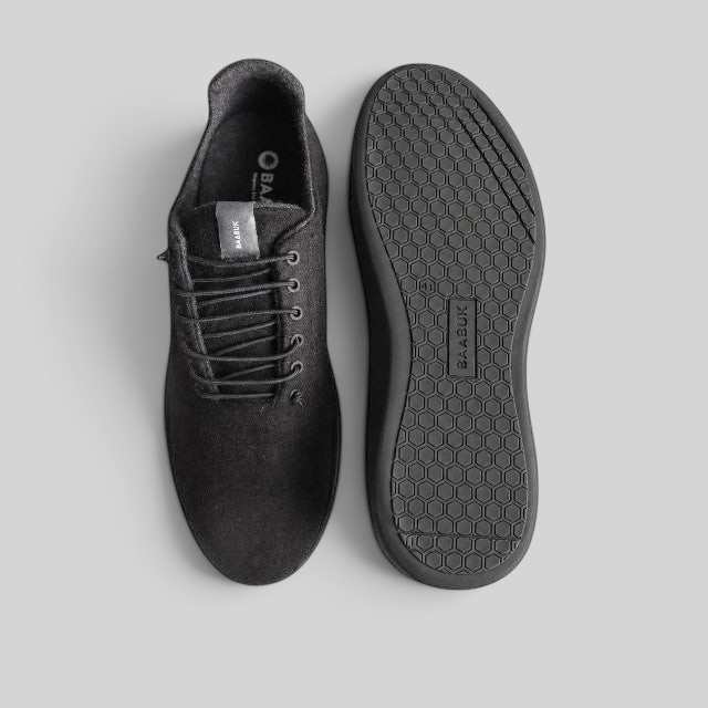 Baabuk Classic Wooler black sneakers featuring a natural wool upper and a durable hexagonal patterned TPU sole.