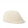 Baabuk Blacknose wool beret in cream, inspired by traditional Portuguese shepherd hats, made in Portugal.