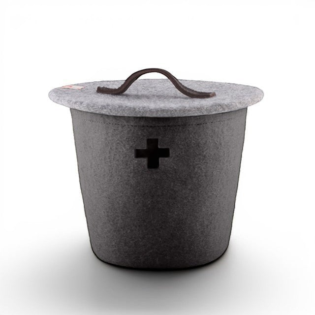 Baabuk small dark grey felted wool basket with a light grey lid, leather handle, and Swiss cross cutout detail.