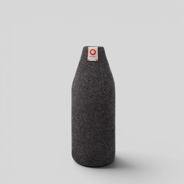 Baabuk dark grey insulated wool bottle cover with a small branded fabric tag, handmade from natural New Zealand wool.