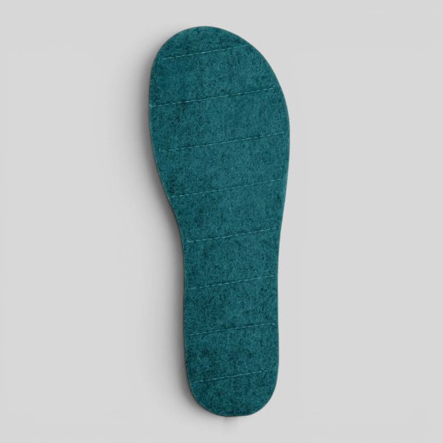 Baabuk emerald green handcrafted felt slipper insoles with horizontal stitching for a customisable fit.
