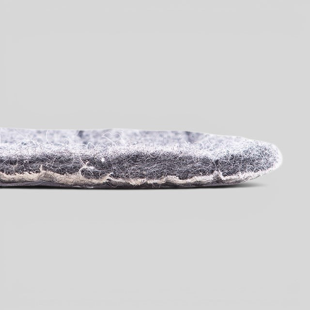 Baabuk handcrafted grey felt slipper insoles for added comfort, designed to be trimmed for a precise fit.