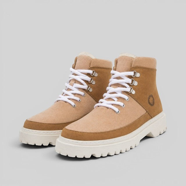 Baabuk Ice Wooler sand rose wool boots with white laces, nubuck leather details, and a durable lugged rubber sole.