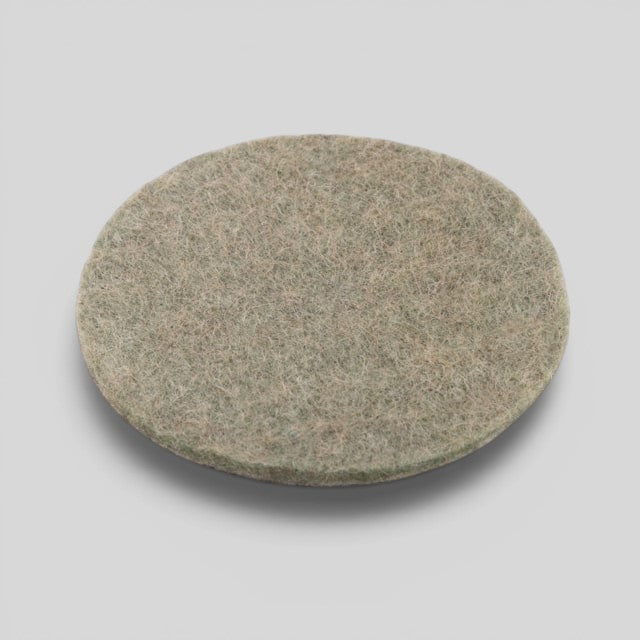 Baabuk khaki felted wool coaster made from natural New Zealand sheep wool for furniture protection.
