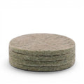 Baabuk set of four round khaki felt coasters made from 100% natural wool for furniture protection.