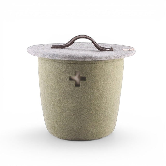 Baabuk small khaki felted wool basket with a lid, brown leather handle, and Swiss cross cutout detail.