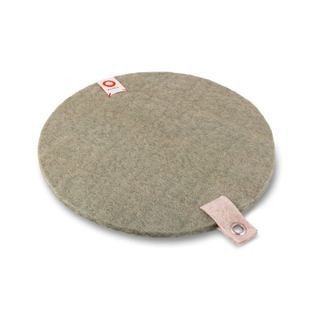 Baabuk round khaki felted wool trivet hot plate with a leather hanging strap for kitchen surface protection.