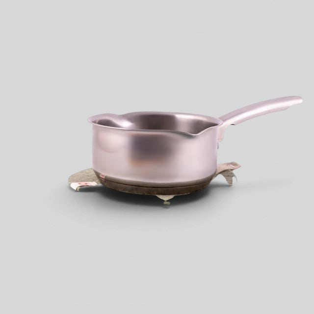 Baabuk khaki felted wool trivet hot plate with a leather strap, protecting a stainless steel saucepan on a table.