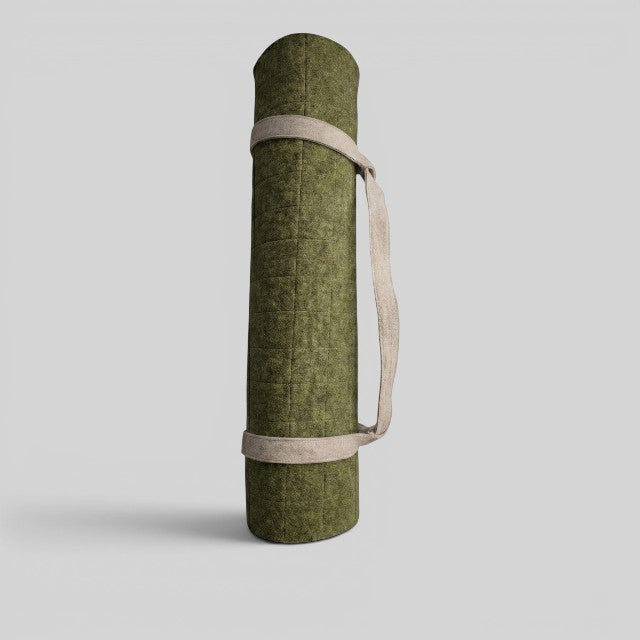 Baabuk khaki felted wool yoga mat rolled up with a cotton carrying strap against a light grey background