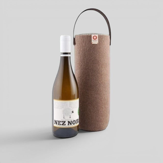 Baabuk moka wool wine cooler with a leather strap, designed to keep wine chilled without ice.