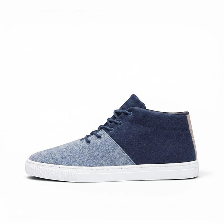 Baabuk Sky Wooler sneakers in blue wool with a white rubber sole and nubuck heel detail, side profile view.
