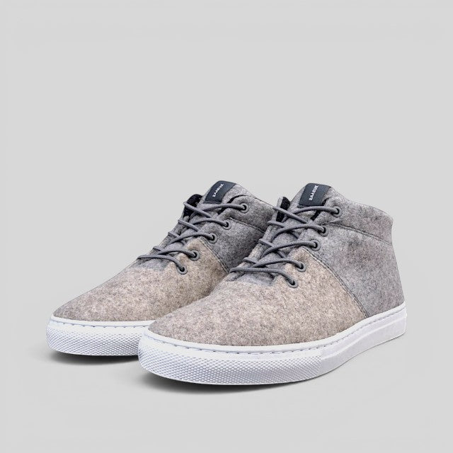 Baabuk Sky Wooler sneakers in middle grey featuring a natural sheep wool upper, rubber sole, and elastic laces.