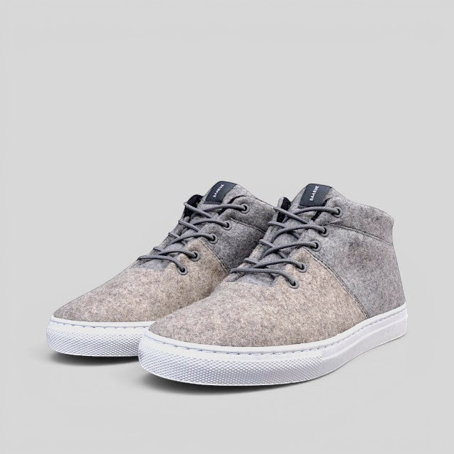 Baabuk Sky Wooler sneakers in middle grey featuring a natural sheep wool upper, rubber sole, and elastic laces.
