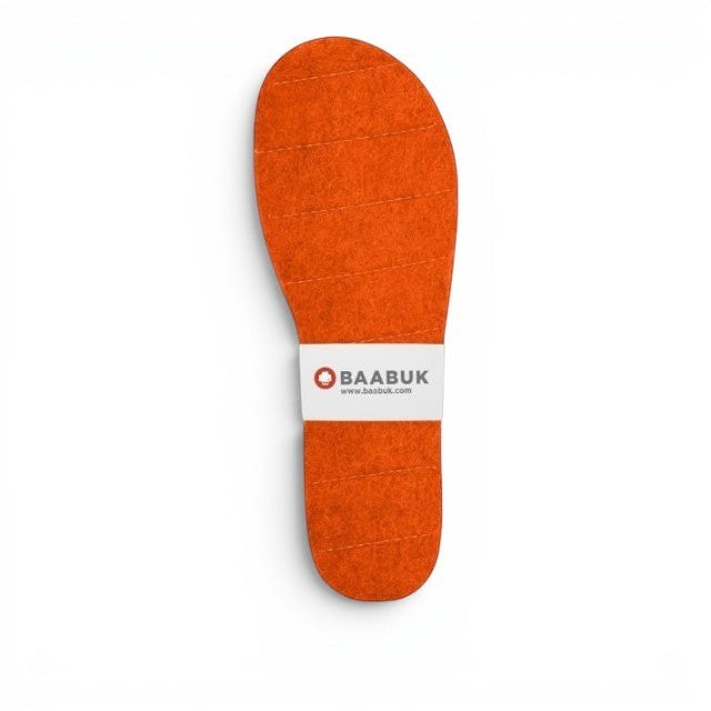 Baabuk tangerine wool felt slipper insoles, handcrafted in Nepal for extra comfort and a customizable fit.