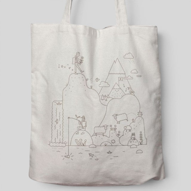 Baabuk cream cotton tote bag featuring a whimsical Swiss-inspired line art illustration of mountains and sheep.