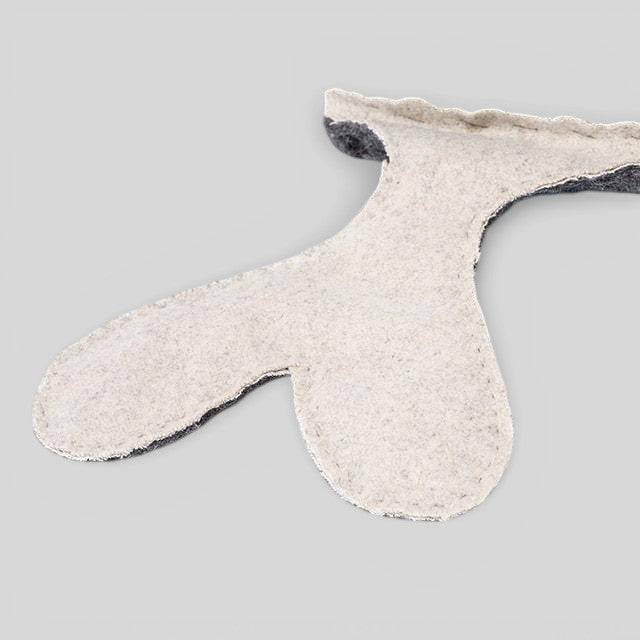 Baabuk Whalebuk handmade grey and cream wool whale storage tail detail, crafted from natural New Zealand wool.