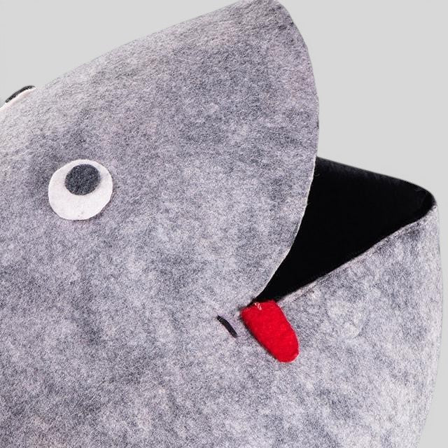 Baabuk handmade grey wool Frogbuk storage basket with hand-stitched frog features and a red felt tongue.