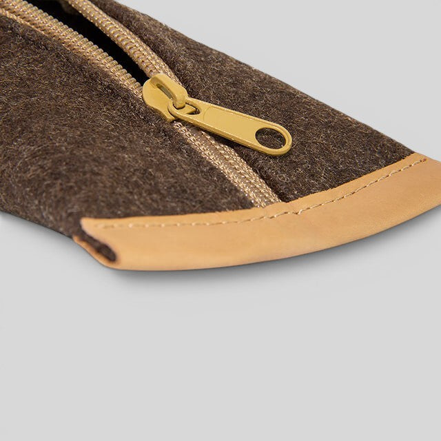 Baabuk brown wool pencil case with leather trim and gold zipper. Zippered pouch for pencils, glasses, or accessories.