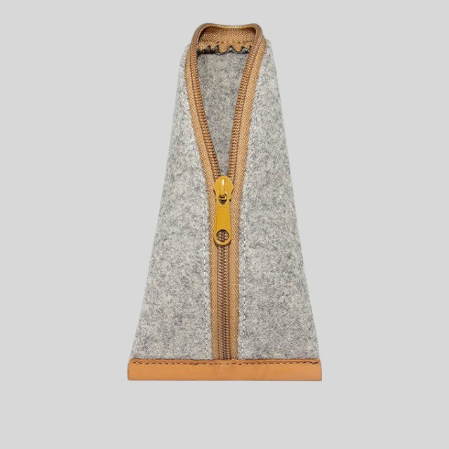 Baabuk grey wool pencil case with leather accents and a yellow zipper closure. Sized for pencils and accessories.
