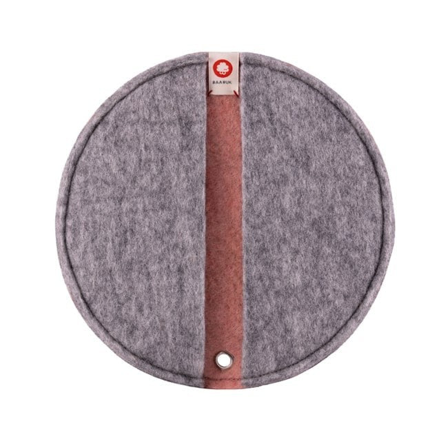 Baabuk round felted wool potholder in grey and pink with a leather hanging loop and branded fabric tag.