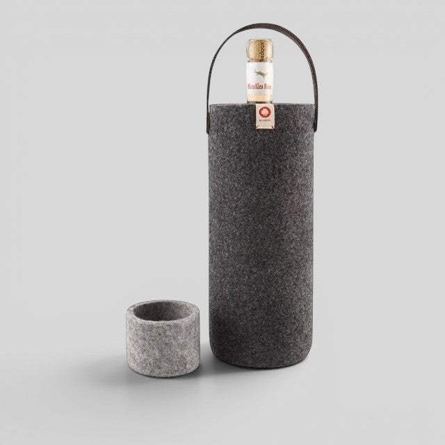 Baabuk dark grey wool wine cooler with leather handle and a separate wool coaster. Holds one wine bottle.