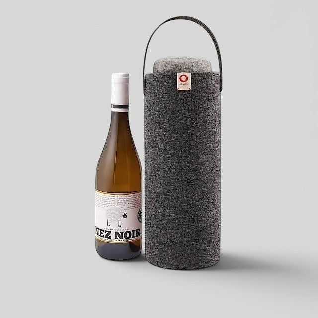Baabuk dark grey wool wine cooler with a leather strap, keeping a wine bottle chilled for picnics or home use.