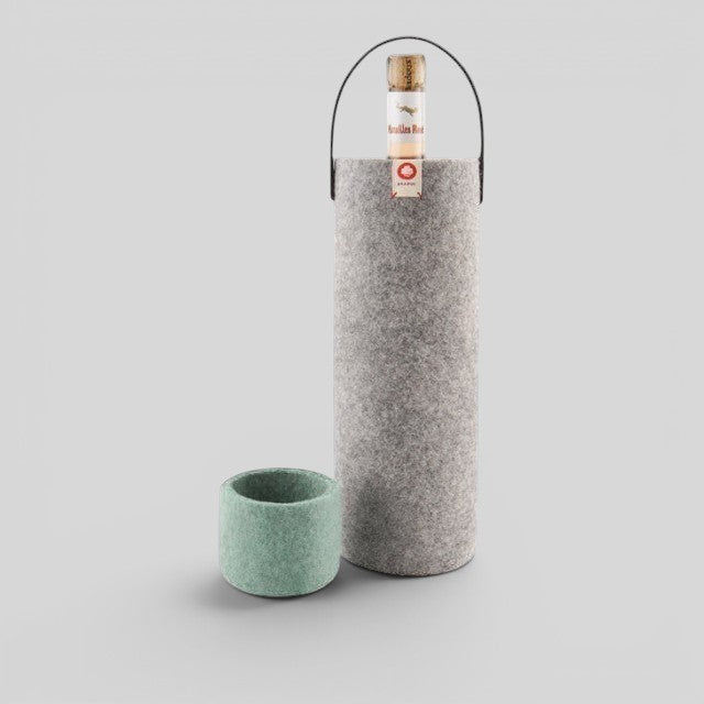 Baabuk light grey wool wine cooler with leather handle and a small mint green wool coaster.
