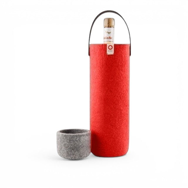 Baabuk red wool wine cooler with leather strap, keeping a bottle chilled for picnics and home use.