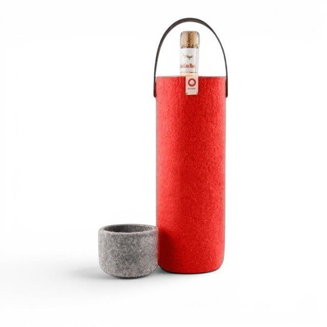 Baabuk red wool wine cooler with leather strap, keeping a bottle chilled for picnics and home use.