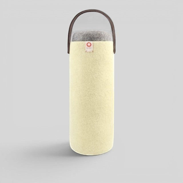 Baabuk yellow wool wine cooler with a brown leather handle, designed for eco-friendly, ice-free bottle insulation.