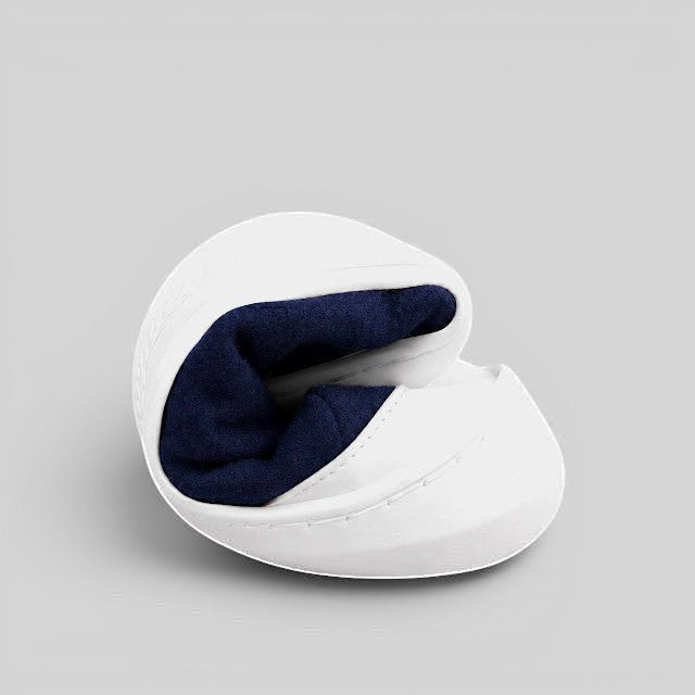 Baabuk Zero Wooler Low navy blue barefoot shoe folded to show flexible rubber sole and wool interior
