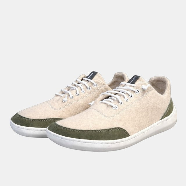 Baabuk Zero Wooler low-cut barefoot shoes in natural wool with white laces and green nubuck accents.