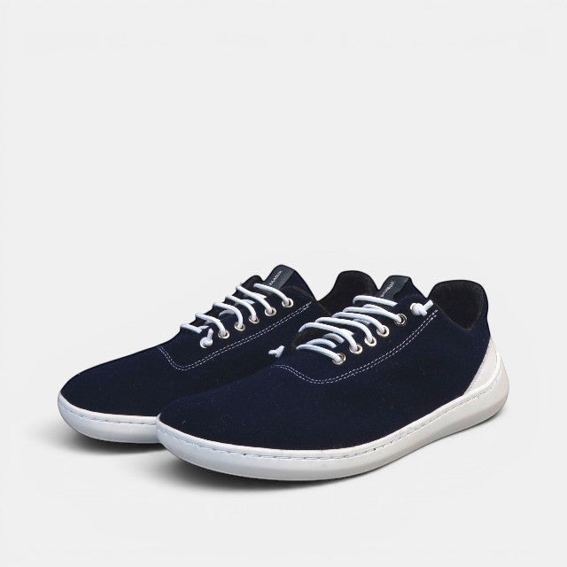 Baabuk Zero Wooler low-cut navy blue wool sneakers with white laces and a white rubber sole.