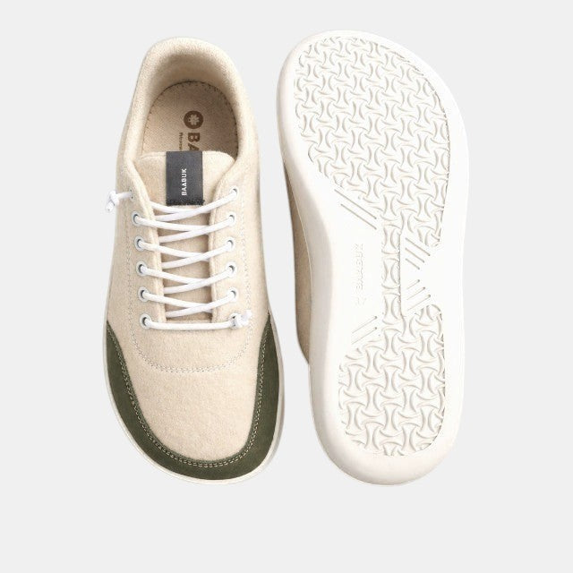 Baabuk Zero Wooler low-cut barefoot shoes in natural wool with white laces and green toe cap. White sole with grip pattern.